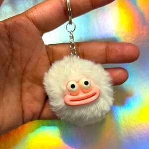 Fluffy Fishman White Keychain with Pink Face